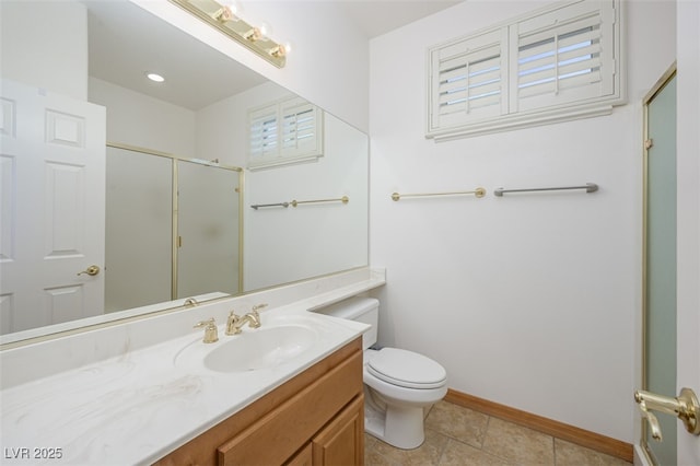 full bath featuring a stall shower, baseboards, toilet, tile patterned flooring, and vanity