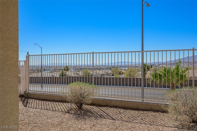 exterior space featuring a gate