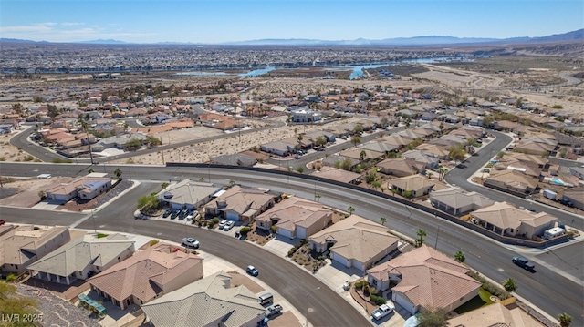 aerial view featuring a residential view and a mountain view