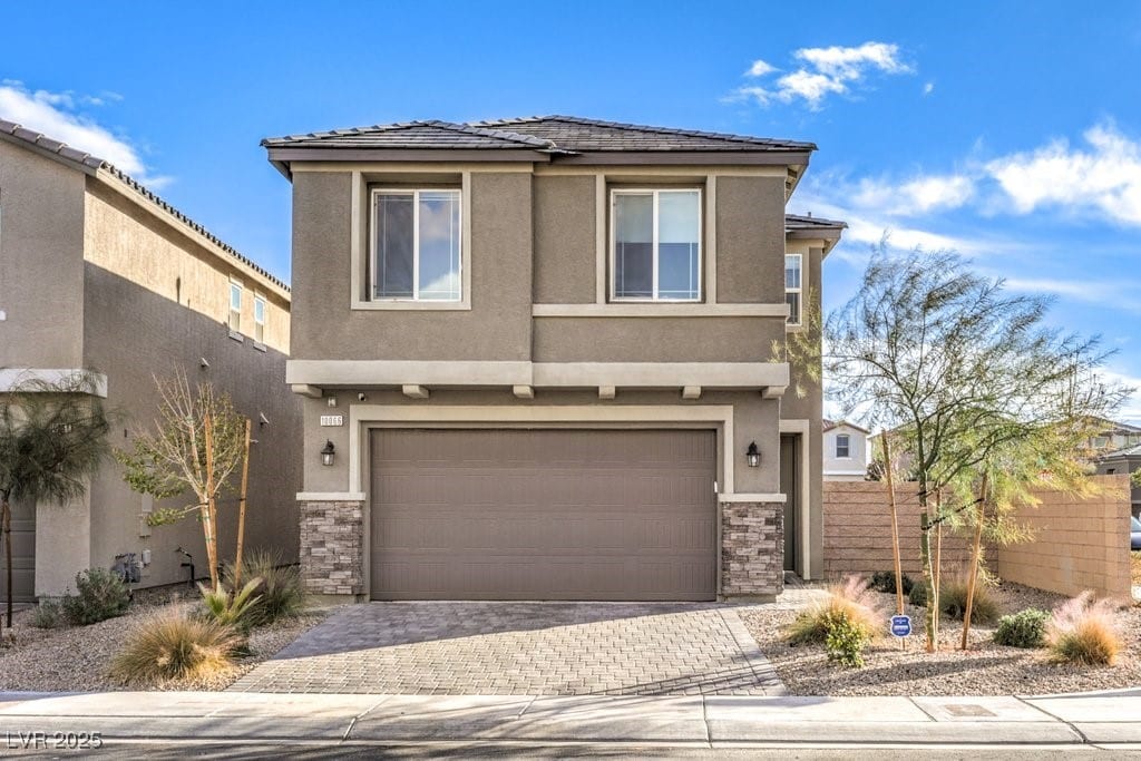 view of front of property featuring a garage