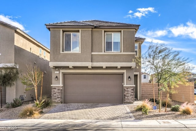 view of front of property featuring a garage