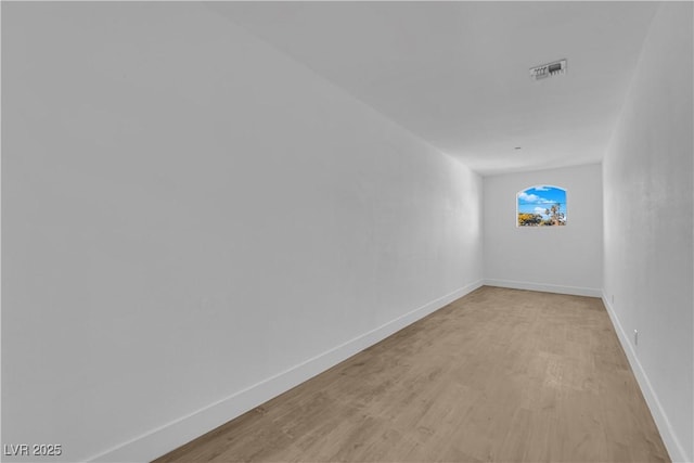 empty room featuring light hardwood / wood-style floors