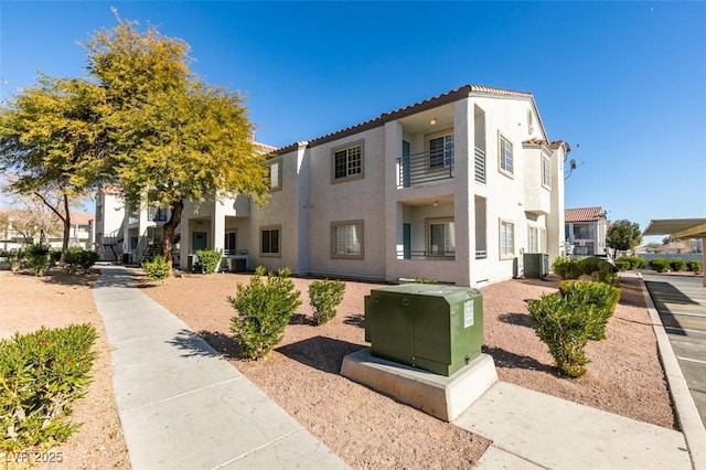 view of property with central AC unit