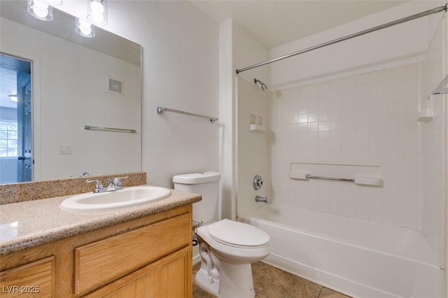 full bathroom with bathing tub / shower combination, vanity, and toilet