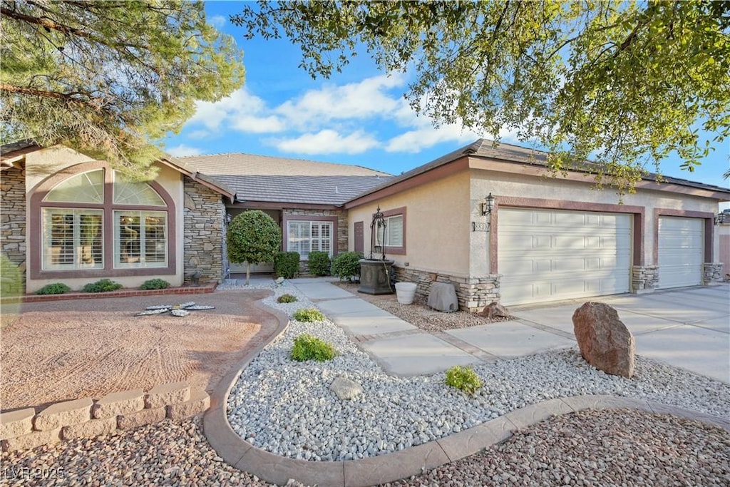 single story home featuring a garage