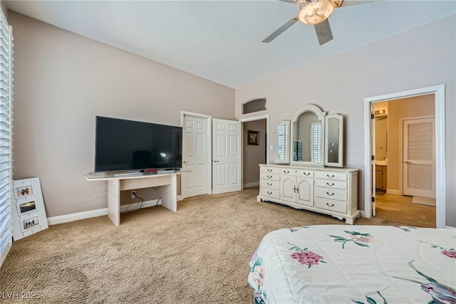 bedroom with ceiling fan and light carpet