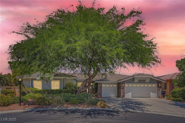 view of front of property with a garage