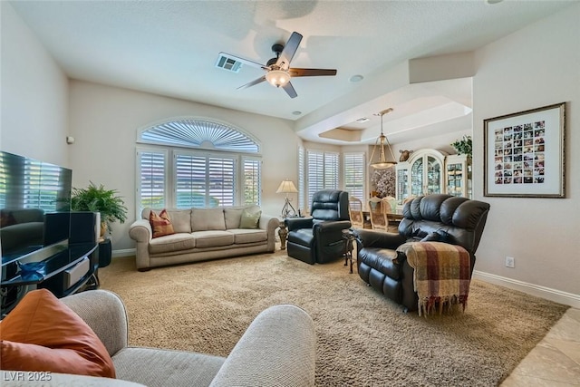 living room with ceiling fan