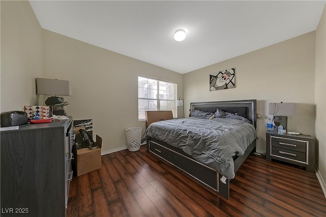 bedroom with dark wood-type flooring