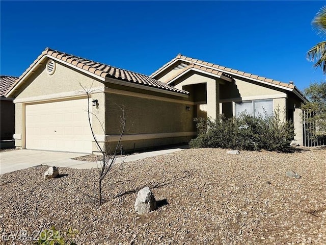 view of side of property featuring a garage