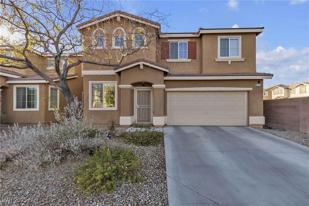 view of front of home featuring a garage