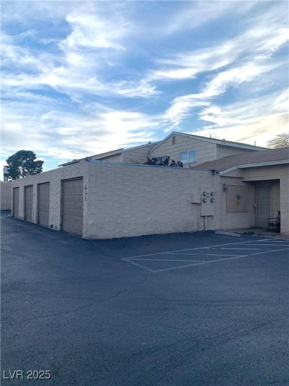 view of building exterior with a garage