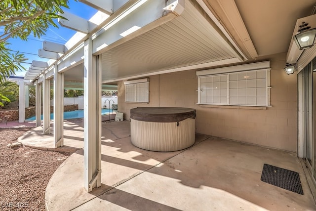 view of patio with a pergola and a pool with hot tub