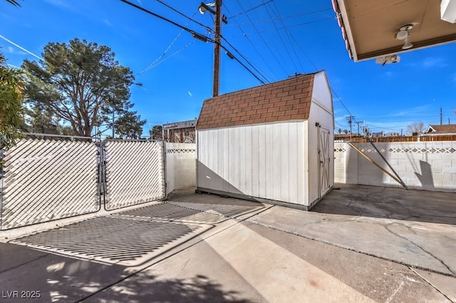 view of patio / terrace featuring a shed