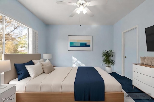 bedroom featuring ceiling fan