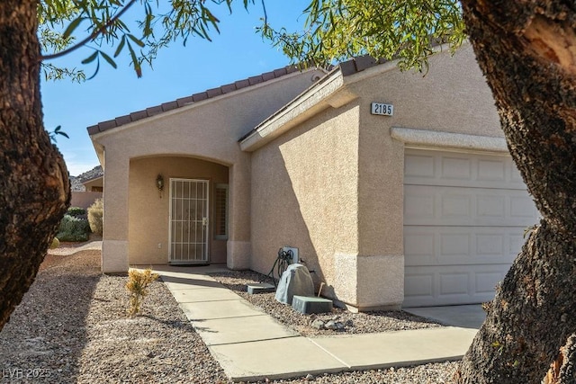 entrance to property with a garage