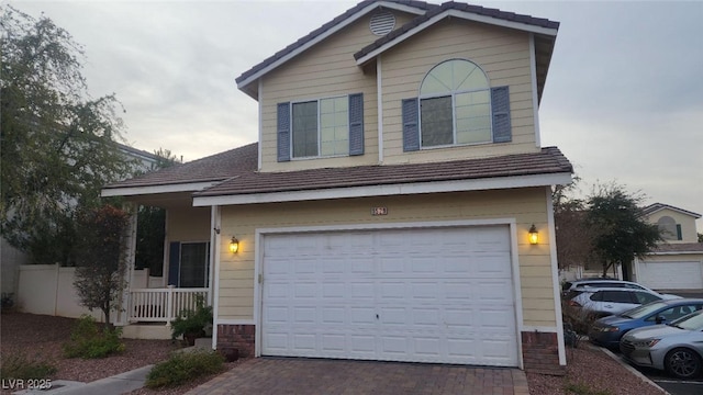 view of property featuring a garage