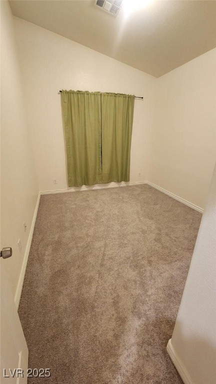 unfurnished room featuring carpet flooring