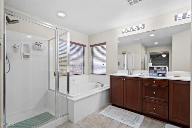 bathroom with tile patterned flooring, vanity, ceiling fan, and independent shower and bath