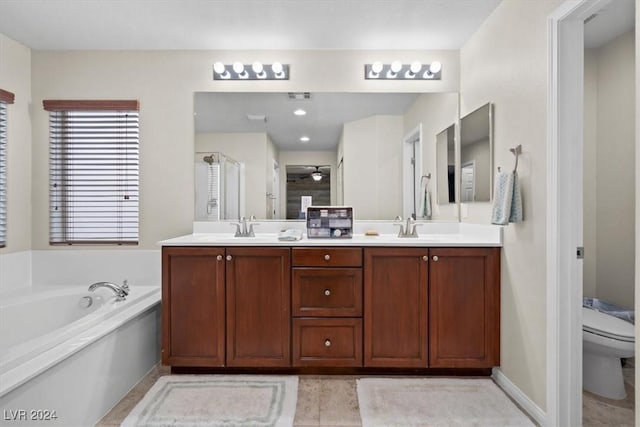 full bathroom featuring separate shower and tub, tile patterned flooring, vanity, and toilet