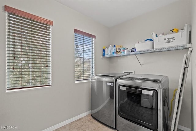 laundry area with washer and clothes dryer