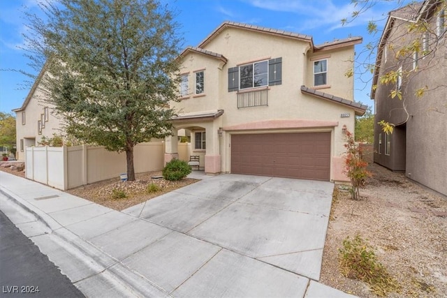 view of front of property with a garage