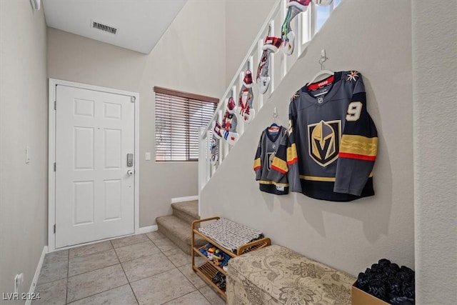 mudroom featuring light tile patterned flooring