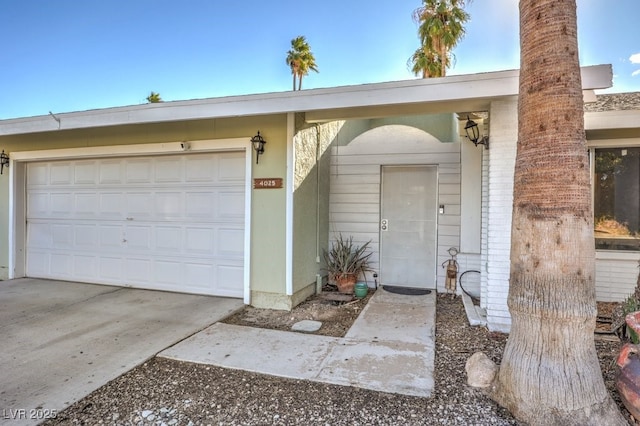 property entrance with a garage