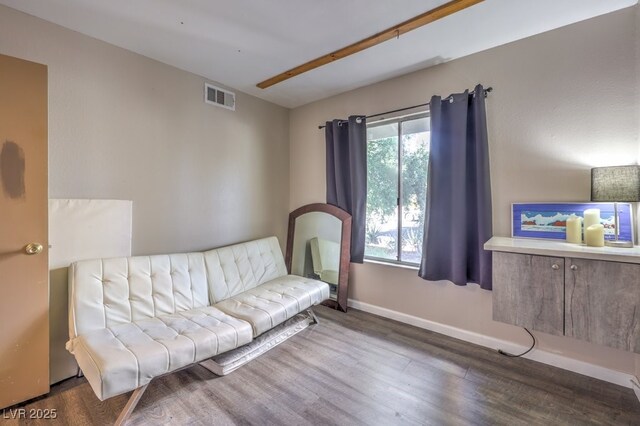 living room featuring dark hardwood / wood-style floors