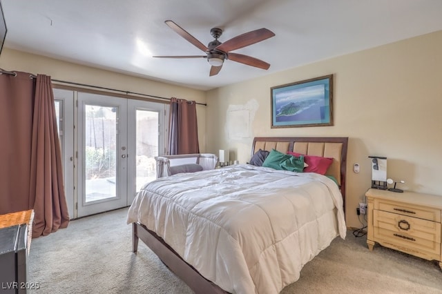 carpeted bedroom with french doors, ceiling fan, and access to outside