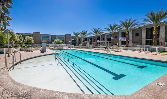 view of pool featuring a patio area