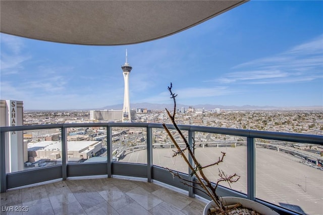 balcony featuring a mountain view