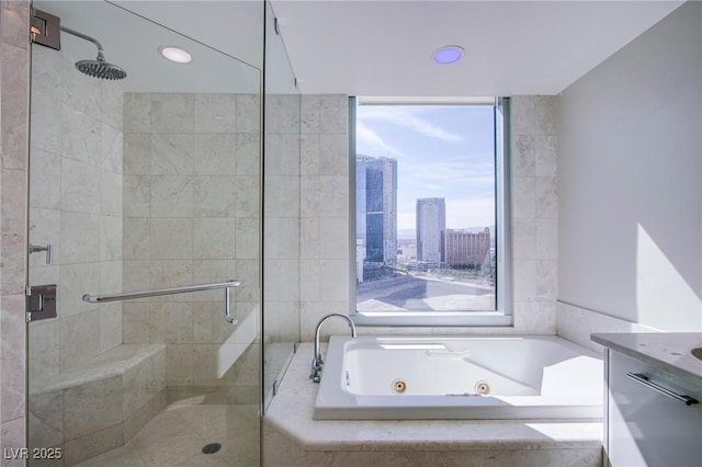 bathroom with separate shower and tub and vanity