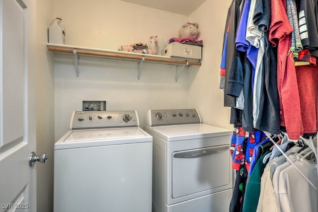 laundry room with washer and dryer