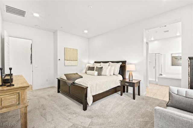 bedroom with light tile patterned floors