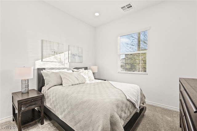 bedroom with light carpet