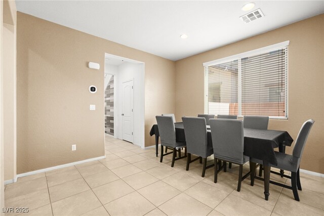 dining room with light tile patterned floors