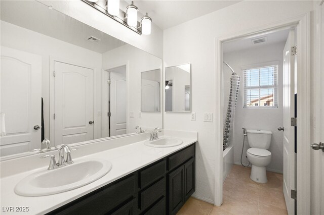 full bathroom featuring vanity, tile patterned flooring, shower / bathtub combination with curtain, and toilet