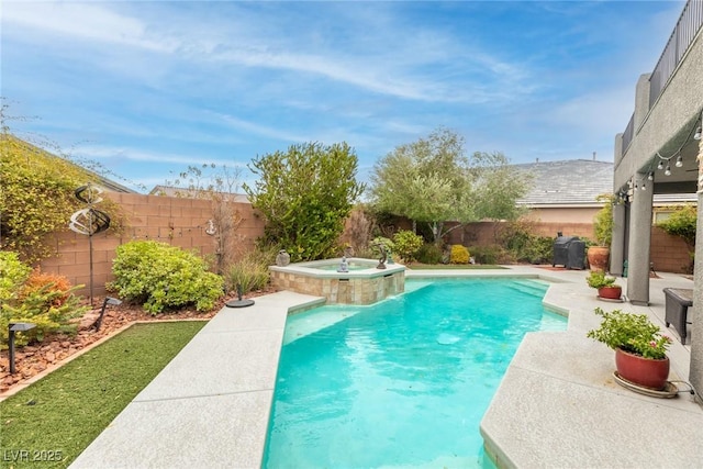 view of swimming pool featuring an in ground hot tub