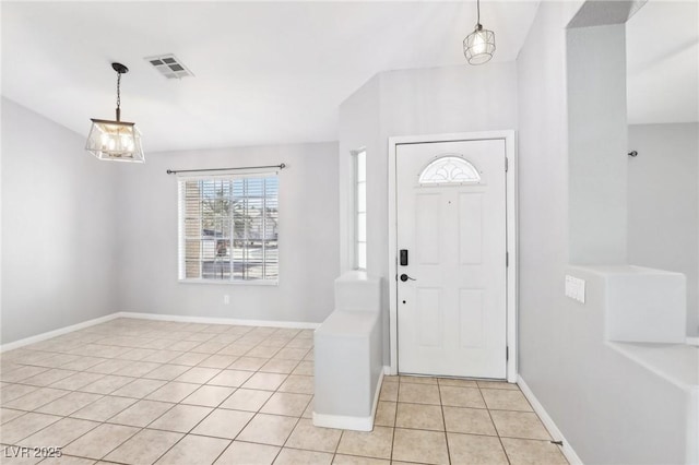 entrance foyer featuring light tile patterned flooring