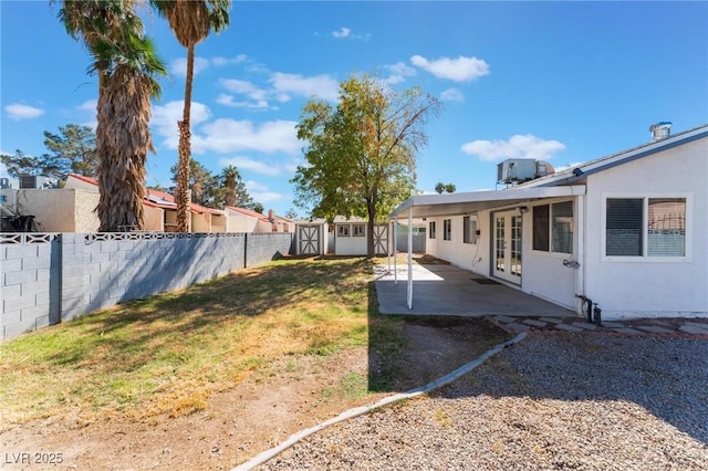 view of yard featuring a patio area and central AC unit