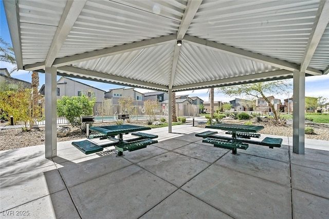 view of property's community with a patio area