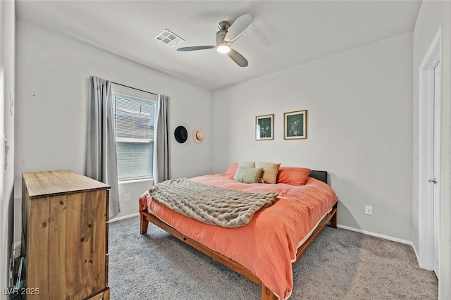 bedroom with ceiling fan and carpet floors