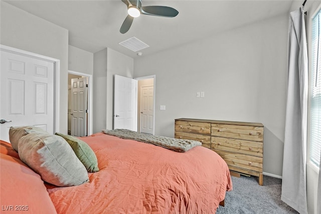 carpeted bedroom with ceiling fan