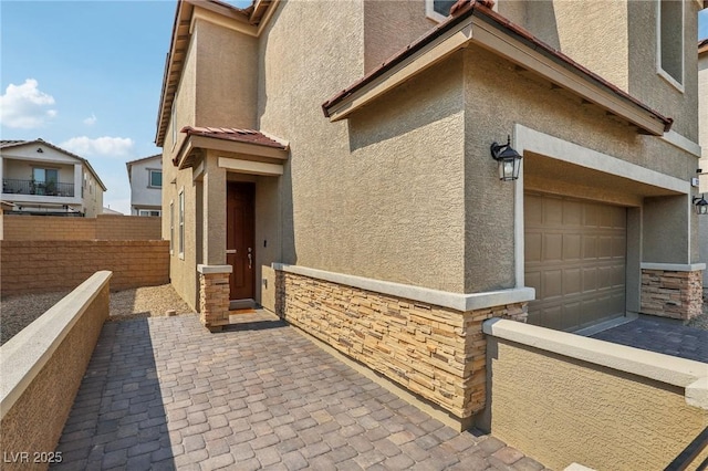 entrance to property with a garage