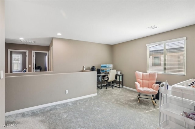 carpeted office with a wealth of natural light