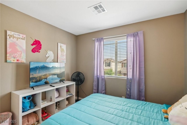 bedroom featuring multiple windows