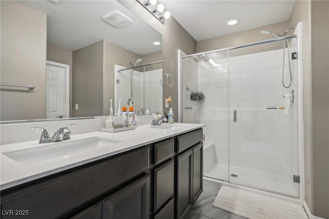 bathroom with vanity and walk in shower