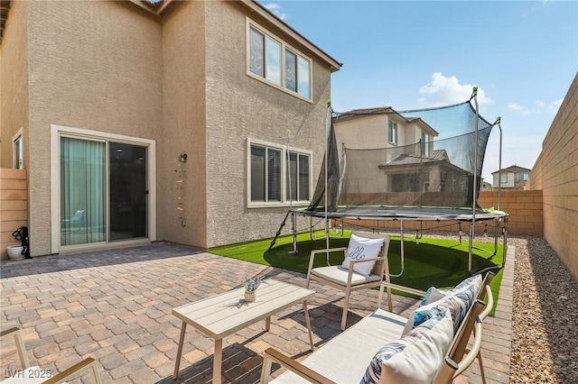 view of patio / terrace featuring outdoor lounge area and a trampoline