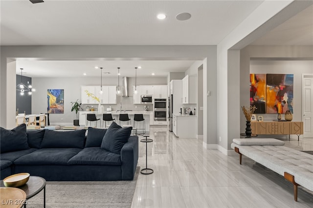 living room with an inviting chandelier